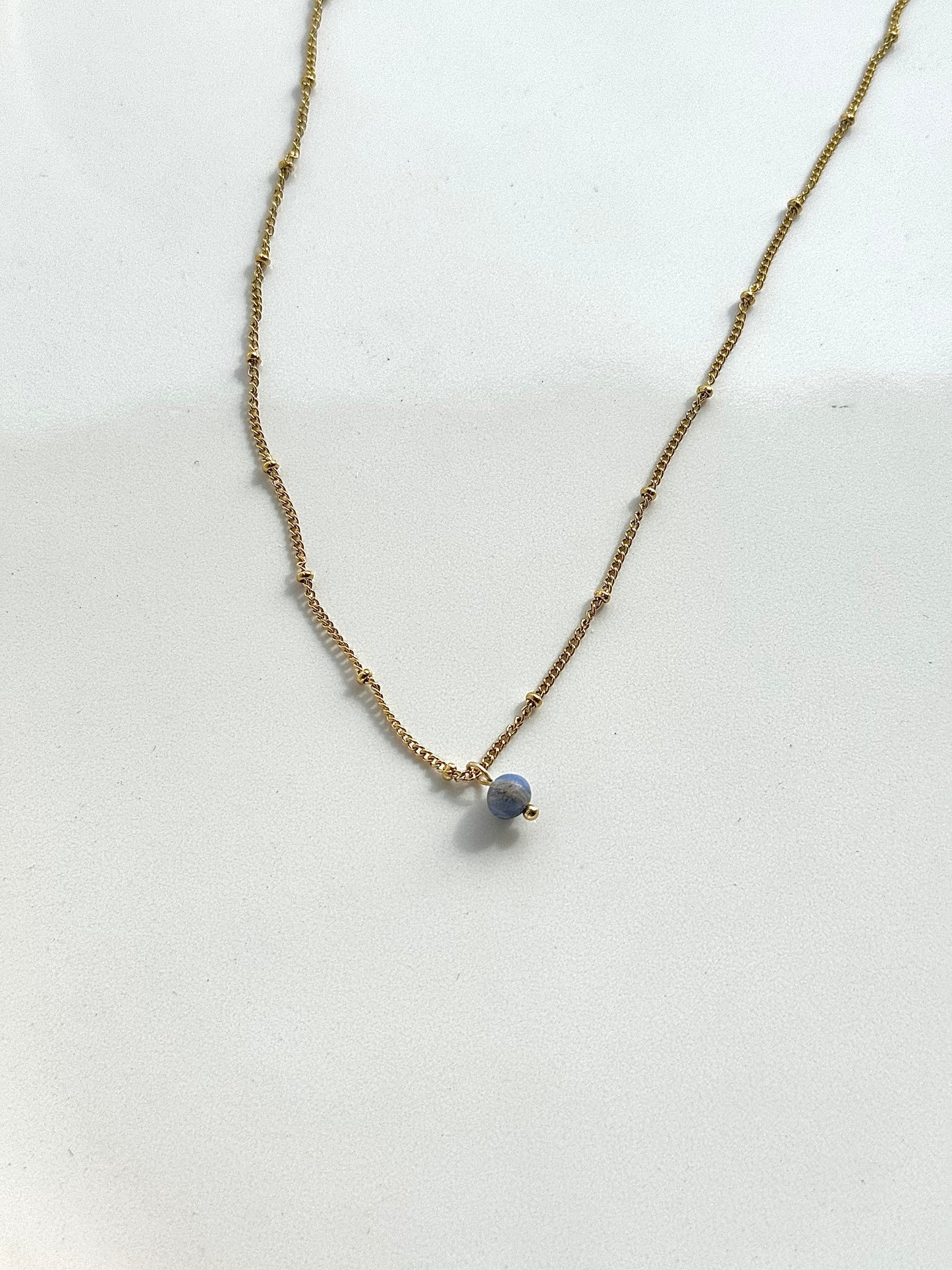 golden pearl necklace with blue pearl pendant 40,5 cm long